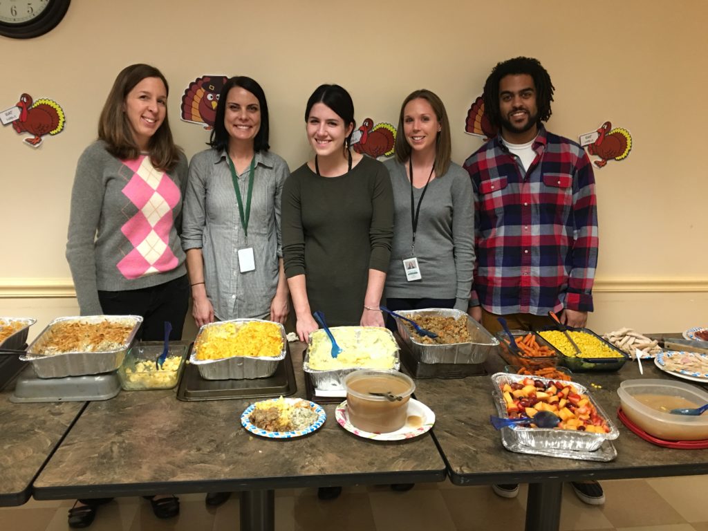 College Experience staff serving up Thanksgiving dishes! From left: Maggie Erlich, Special Projects; Kelly Weiss, QIDP; Katie Fahrenkopf, Academic Coordinator; Colleen Dergosits, Admissions and Coordinator of Student Life; Dominick Brown, Community Coordinator. 